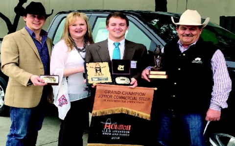 Dawson Dittrich of Schulenburg won Grand Champion in the commercial steer category at the Houston Livestock Show and Rodeo on Tuesday, March 9. Some of the prizes include $2,000 cash, award buckles, trophies, and a $32,000 certificate for a new pickup truck. He is pictured above (from left) with his brother Dax, mother Melissa Dittrich and father Donnie Dittrich.